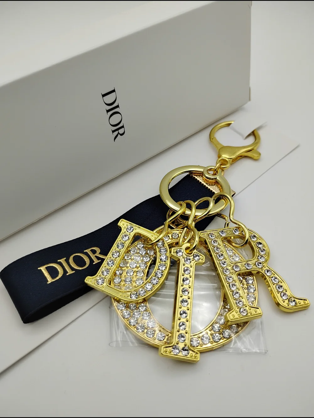 Dior Gold Crystal 'D I O R' Logo Keychain with Black Ribbon BNIB